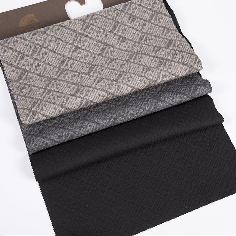 Geprägte Buchstaben-Twill-gestrickte Jacquard-Polyester-Viskose-Spandex-Sportbekleidungsstoffe für Kleidung AW23016